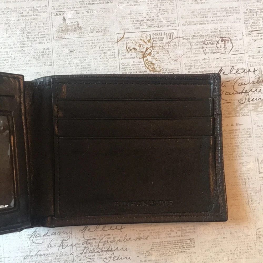 Calvin Klein Textured Leather Bi-Fold Wallet